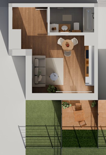 Rzut mieszkania z góry: hol, łazienka z wanną, pokój z aneksem i ogródek z tarasem
